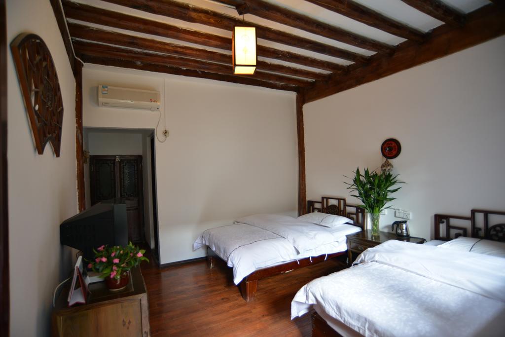 Lijiang Ancient Town International Youth Hostel Kamer foto